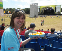 Festival Food - The Festival Eating and Festival Cooking Guide - Steph eating chips in the main arena at Latitude Festival